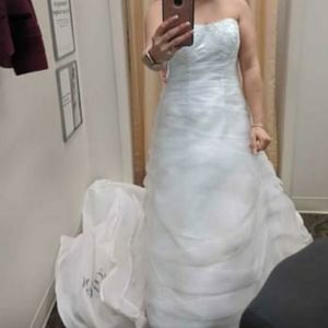 Size 4 brand new wedding dress